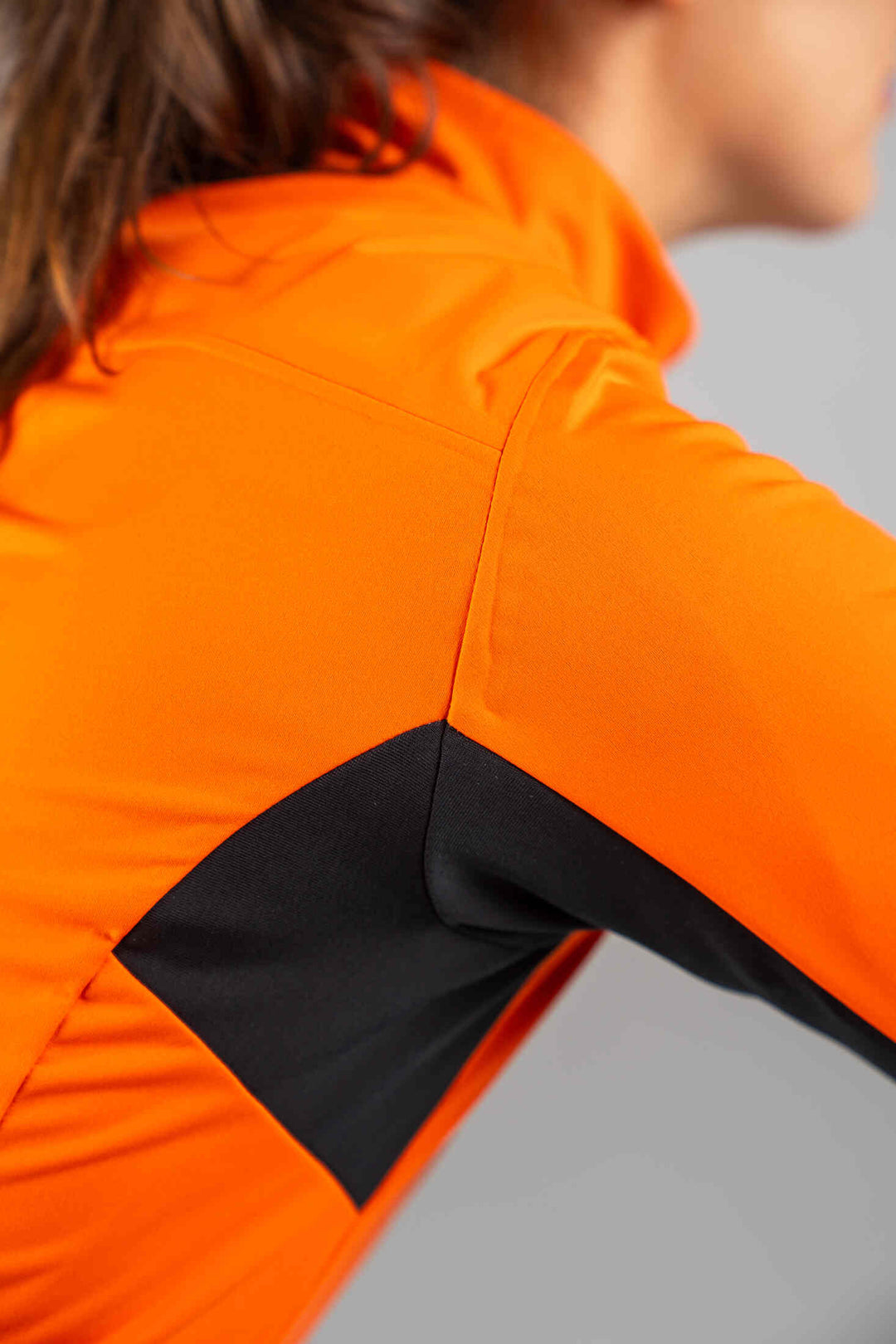 Women's Red Orange Water-Resistant Short Sleeve Cycling Jacket - Underarm Venting